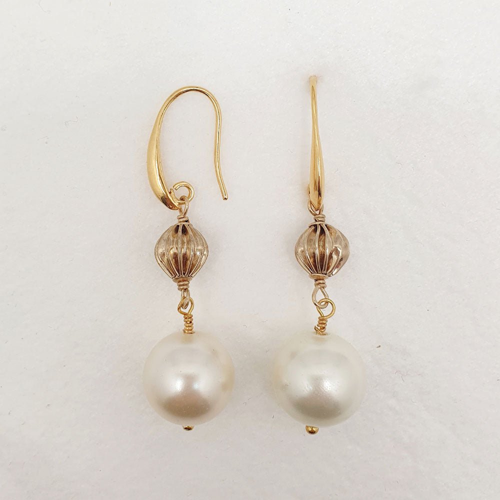 Boucles d'oreilles de la collection Gabi en or recyclé proposées par 9viescom9