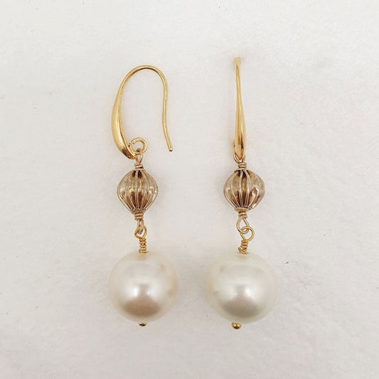 Boucles d'oreilles de la collection Gabi en or recyclé proposées par 9viescom9
